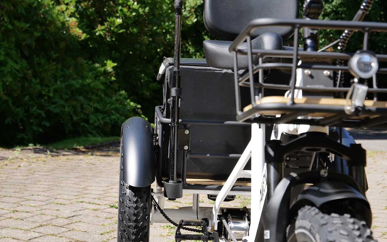 Close-up of the Alpine Vale electric trike, with optional walking stick holder.